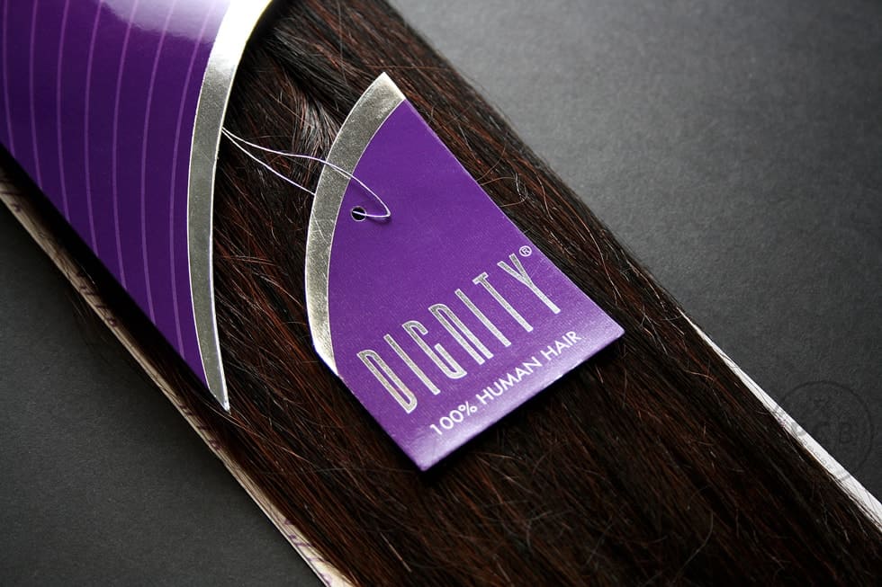 Luxury hair extensions packaging design graphics for swing ticket with artwork by Paul Cartwright Branding.