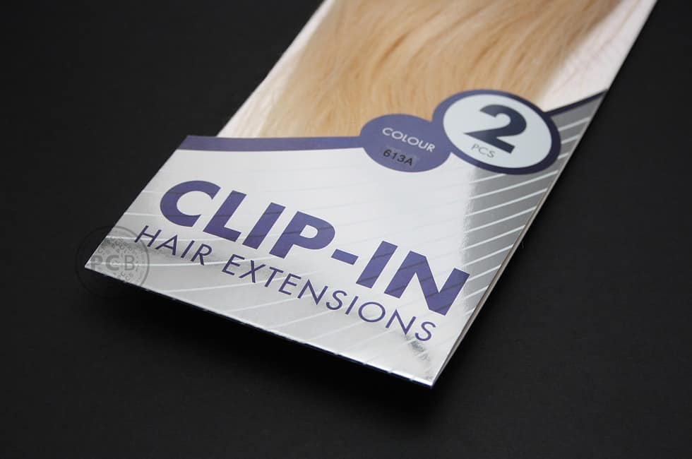 Close-up of hair extensions packaging design graphics as shown on printed insert - design by Paul Cartwright Branding.