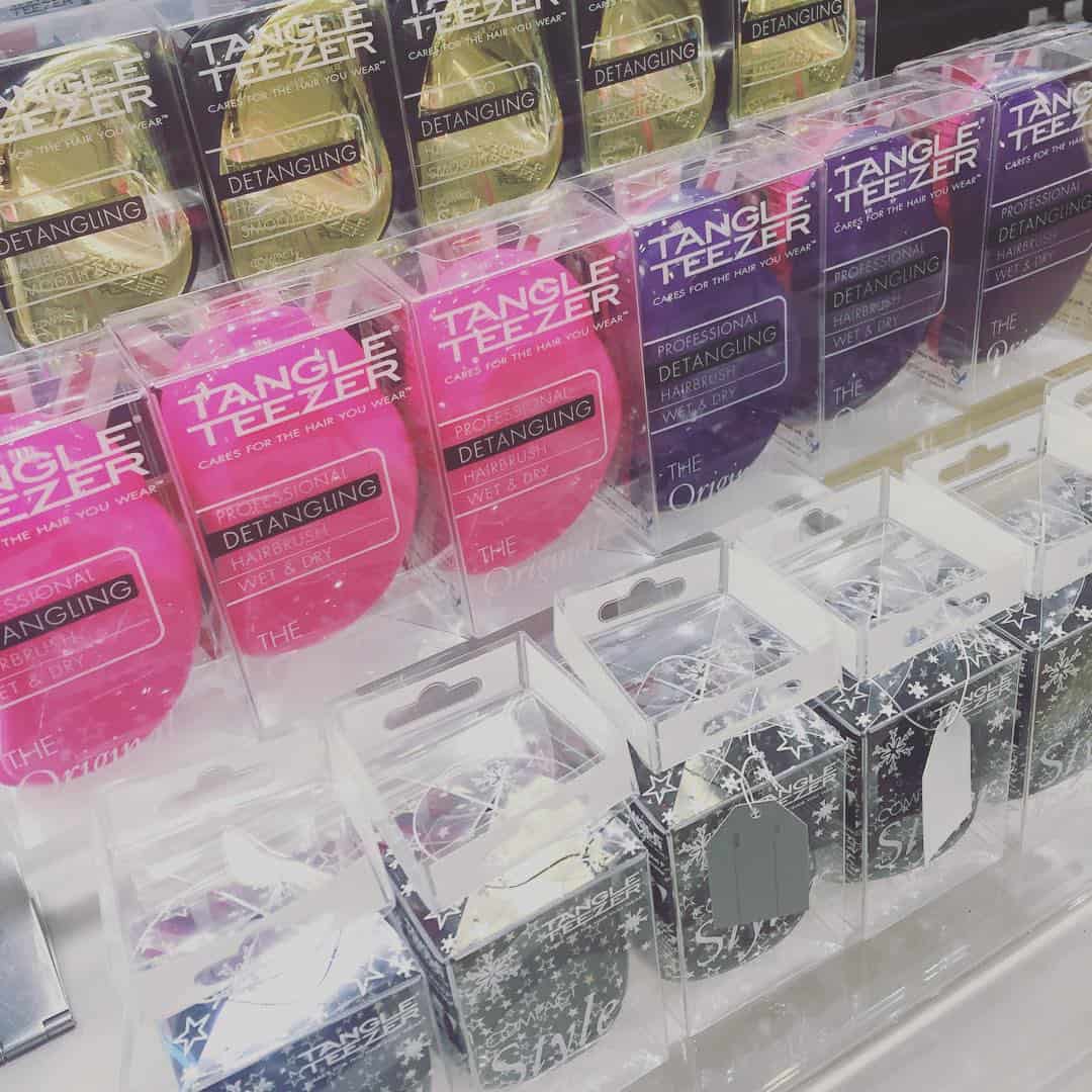 In-store photo of Tangle Teezer's hairbrush product carton graphics design by Paul Cartwright Branding.