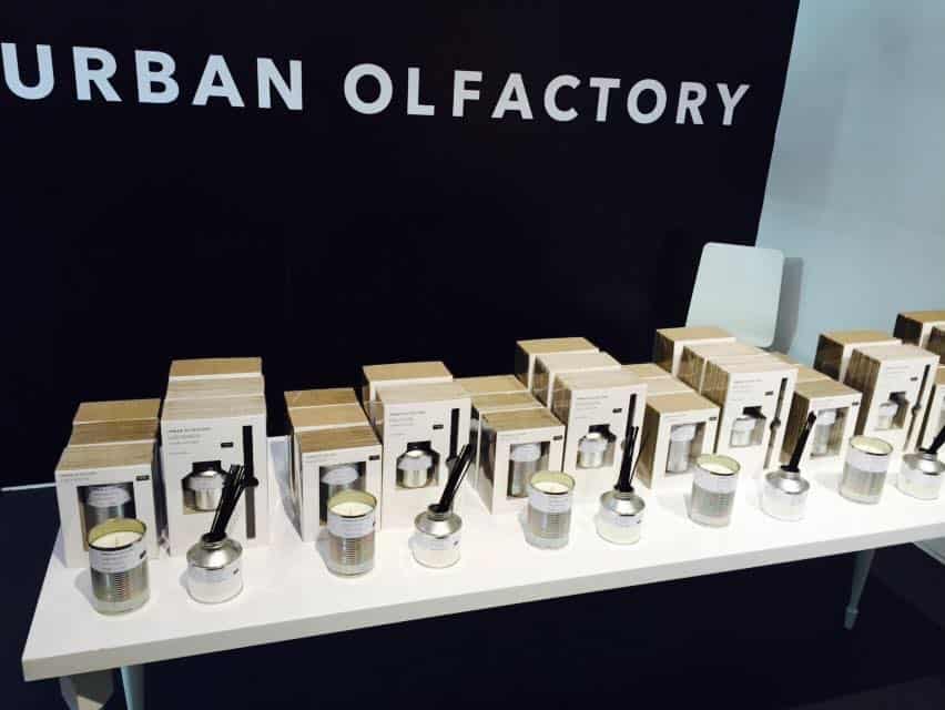 Trade show image of Urban Olfactory fragranced candles and reed diffusers, with candle packaging graphics design by Paul Cartwright Branding.