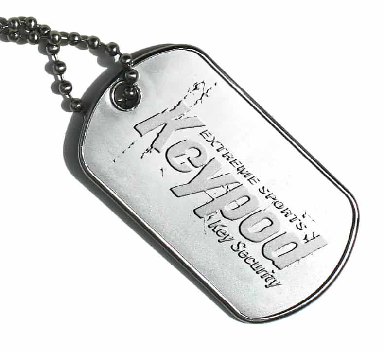 Embossed distressed sports logo on dog tag key chain.