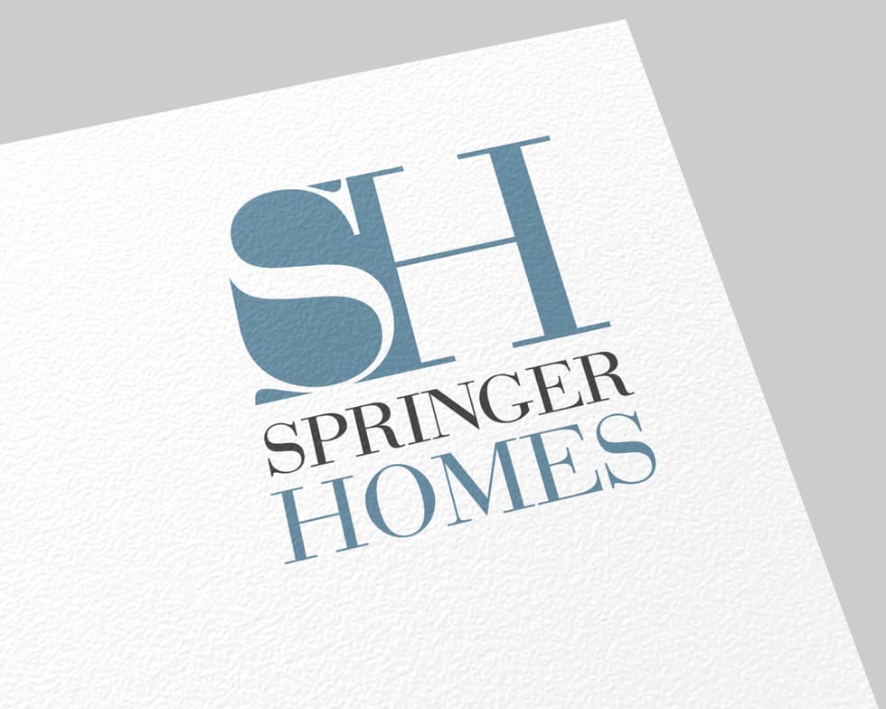 Springer Homes estate agents logo and stationery design by Paul Cartwright Branding.